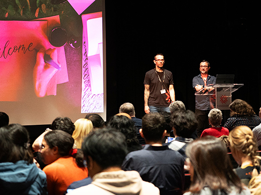 Image of Interactive Media professors Justin and Marco speaking at Industry Night